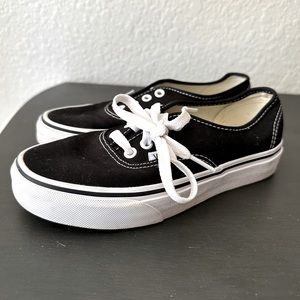 Black low top vans. Canvas. Size 4